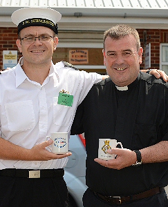 Southport born duo Leading Engineering Technician (ME) John Conroy (Left) and his uncle Rev Ernie Grimshaw outside The Haven chaplaincy at HMS SULTAN. 