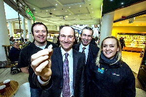 From left to right; Dean Paton of Big Heritage, Rob Henshaw with the Neolithic arrow head, Derek Millar, Commercial Director for Pyramids Shopping Centre and Joanne Kirton, also of Big Heritage.