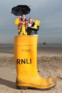 RNLI crew member with Yorkshire Building Society Charity of the Year campaign manager Louise Neill