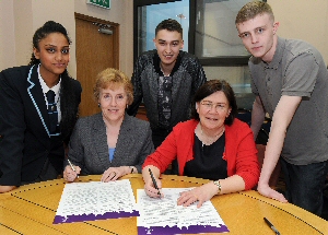 Care leavers sign charter along with (l to r)Director of Children and Young People Services Colette OBrien and Cabinet Member for Education and Childrens Services Councillor Jane Corbett. 