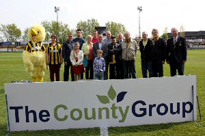 Pre-match on Easter Monday 2014 - County Insurance Sales Director Kevin Catterall, Andrew and Callum Hudson with Trust in Yellow members including Colin Aindow and Southport FC Chairman Charlie Clapham MBE.
