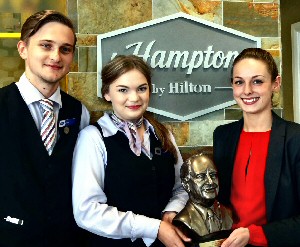 (L to R) Guest Services Managers James Brash and Beth Nolan, with Deputy General Manager Katie Park and their Connie Award. High resolution photograph is available on request.