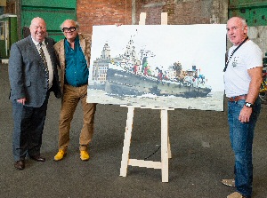 Allen Heron and Mayor of Liverpool Joe Anderson handing over the artwork to Jean Luc Courcoult from Royal de Luxe