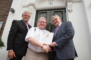  Pictured: Paul Askew receives the accreditation from Chris Brown (right) of Marketing Liverpool and Mark Loynton (left) of Taste Northwest.