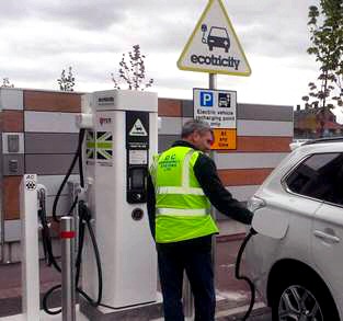 Keith Hollings of DC Emergency Systems Limited who are the Airport’s LED energy saving lighting contractor recharging his Mitsubishi Outlander plug in hybrid car at LJLA