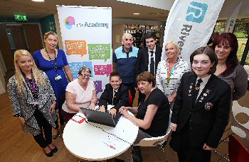 Photograph caption four: L-R: Gateacre IT Teacher Catherine Newall, Riverside Community Engagement Officer Lorna Cotterill, Jean Hindley, Michael Dobie, Patrick Goodison, Stephen Moss, Betty Miller, Radio City’s Caroline Greer, Beth Anderson and Gateacre Community Coordinator Lisa Mitchel.