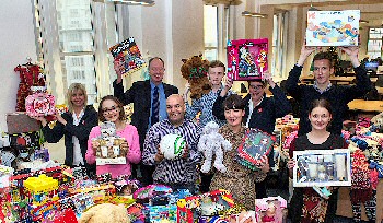 Chief Executive Ged Fitzgerald (back row, far left) with charity champions and representatives of organisations benefiting from the Christmas Gift Appeal.