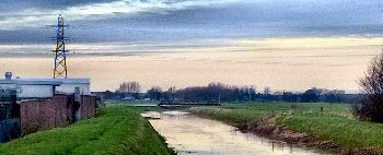 Photo of river Alt and the low lying area by the Formby Trading Estate in December 2015.