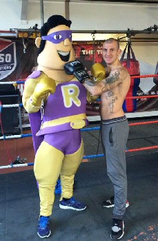 Photo caption: Derry Mathews gets to grips with R Charity’s Roy.