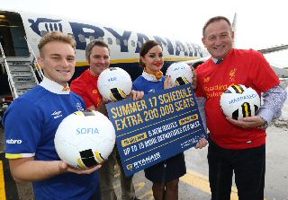 Ryanairs Robin Kiely (2nd left) with LJLAs Andrew Cornish (far right) celebrating todays announcement with Ryanair cabin crew members Owen Strocker and Sarah Twist.