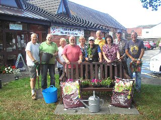Staff and volunteers at Ainsdale Community Care ready to transform their garden for 150th Anniversary.